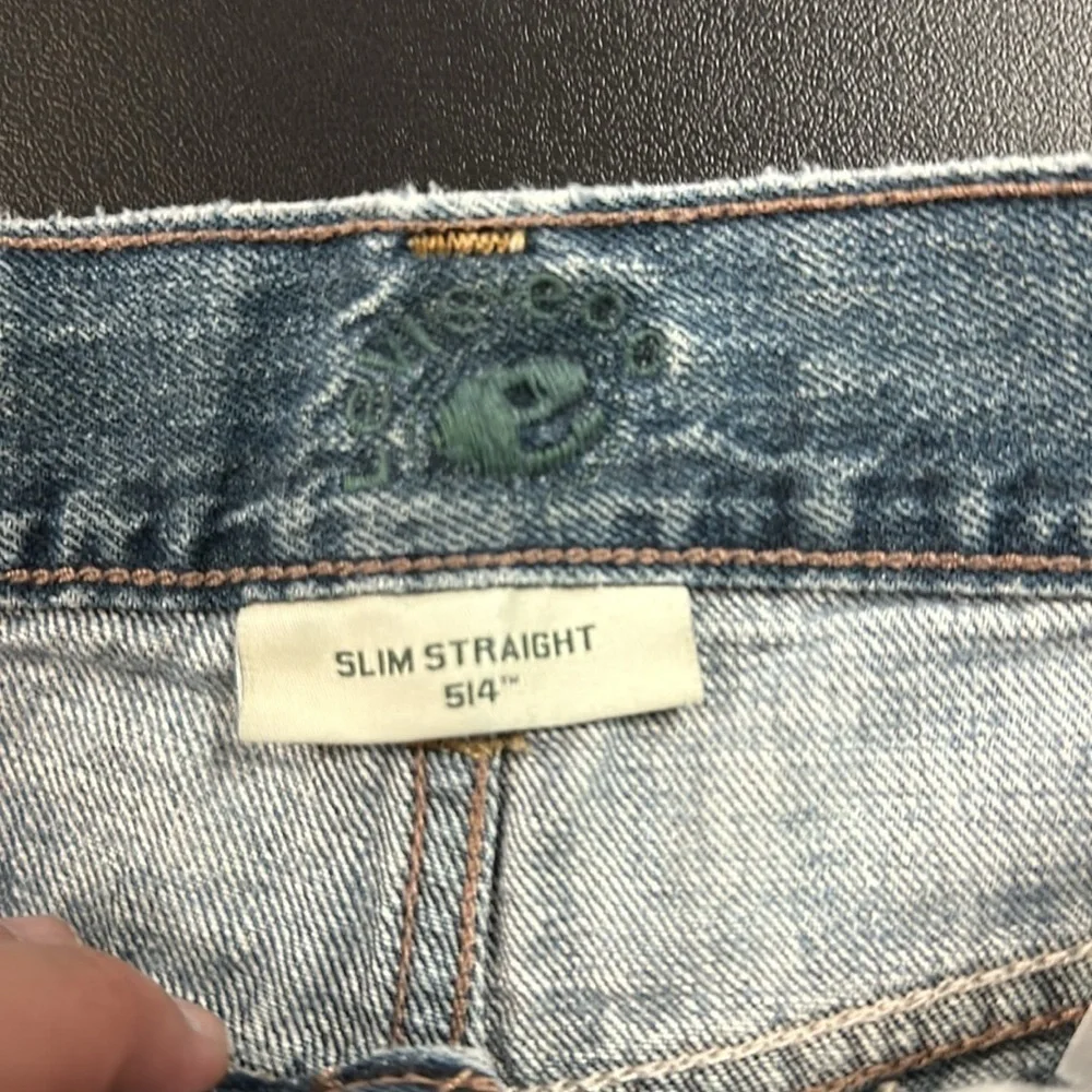 Levi's Women's Blue Frayed and faded Denim Shorts size 30 waist